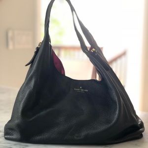 Kate Spade pebbled leather slouch handbag.